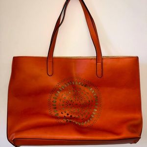 Neiman Marcus shoulder bag to brighten up your look.